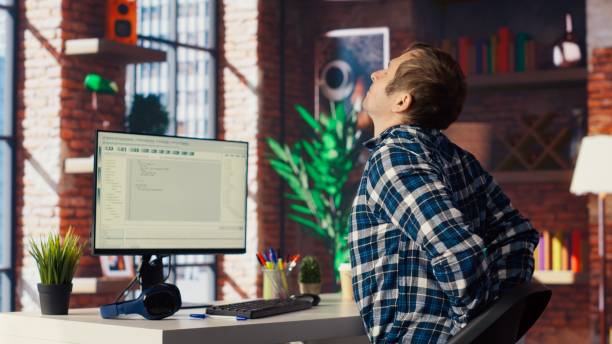 Desk lamp and daylight from window reducing screen glare